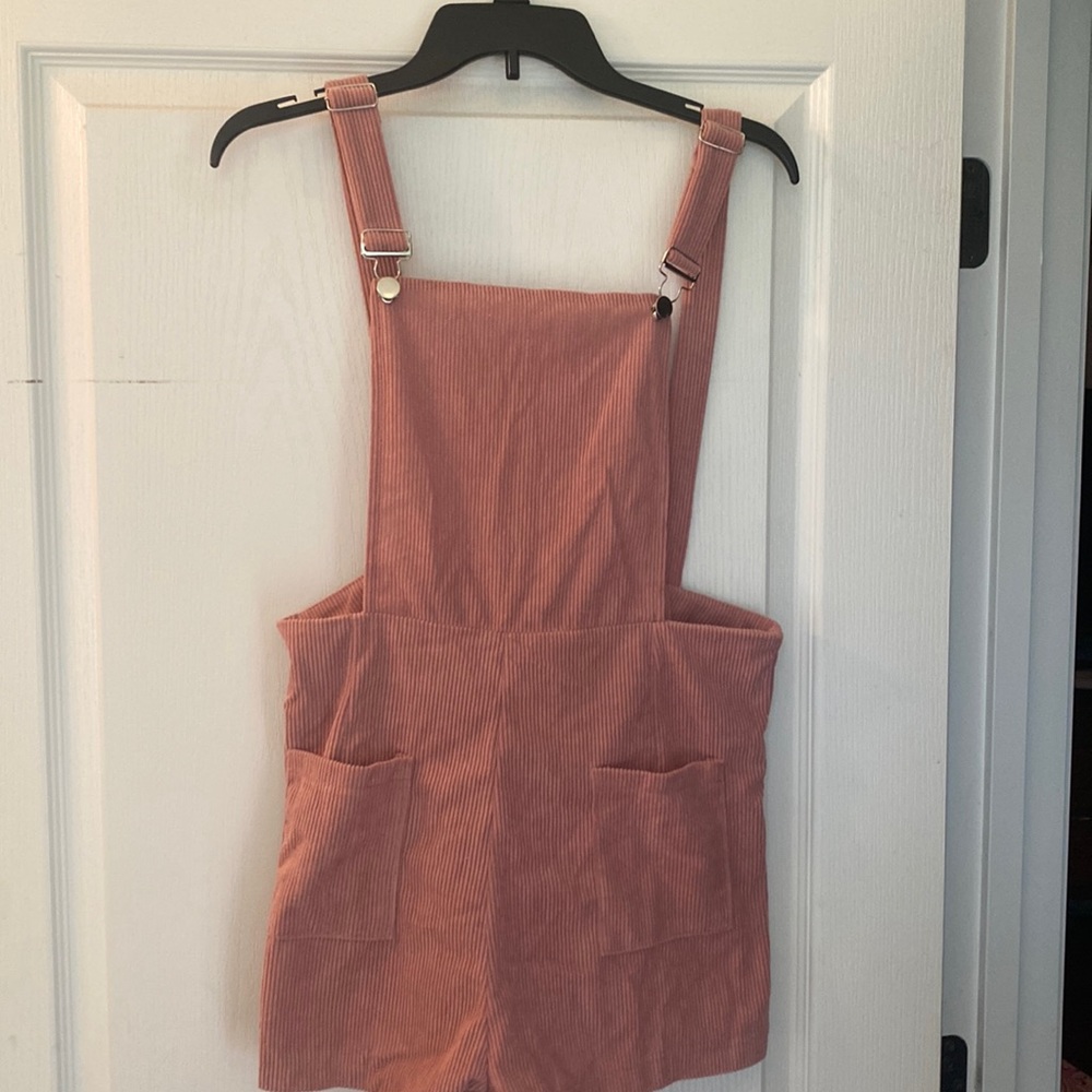 Dusty pink romper size L (8/10). Never worn.